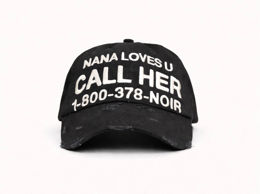 Front view of CALL HER distressed black dad cap with white slogan embroidery