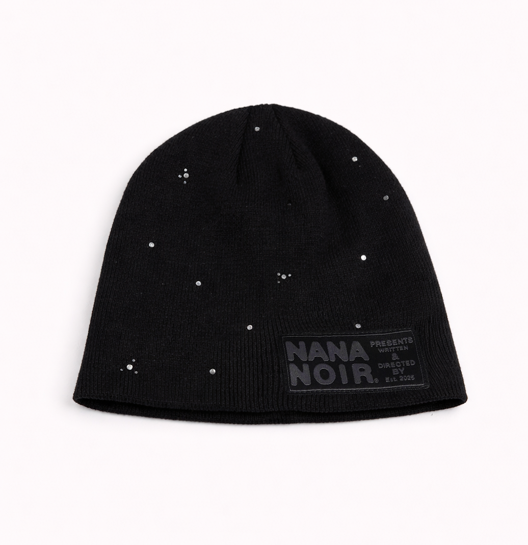 BACK HOME black ribbed beanie with silver studs and tonal Nana Noir patch, front view